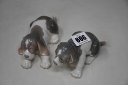 Two Lladro porcelain dog figurines, in good condition.