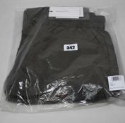 A pair of as new John Elliott Himalayan cargo pants in olive (S - RRP £400).