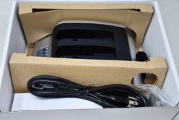 A boxed as new RRC 2-bay battery charger (PN: PMC02A) (Requires UK adapter).