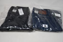 Four pairs of as new G-Star Raw jeans (W24/L30, 3 x W26 L 2 x 30, 1 x 32).
