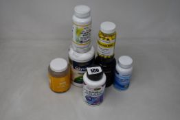 A quantity of assorted health supplements + vitamins and related items.