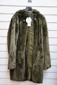 An as new Oui olive green faux fur 3/4 jacket with hood in olive green (EU 36 - RRP £280).