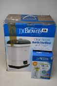 A collection of boxed Dr Brown's Baby Feeding items to include: 1 x Clean Steam Bottle Sterilizer