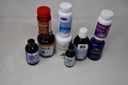 A quantity of assorted health supplements + vitamins and related items.