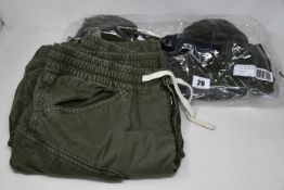 Three pairs of as new G-Star Raw Rovic trousers (W32/L32) and a pair of Rovic shorts (W32).