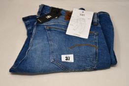 Four pairs of as new G-Star Raw jeans (All W34/L32).