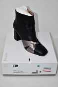 A pair of as new Pollini soft leather ankle boots (Soles show they may have been worn to try but
