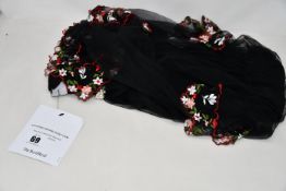 A pre-owned Simone Rocha crew neck, knee length dress with netting and flower decoration (EU 40 -