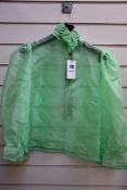 An as new MSGM green silk top (Tag 40).