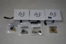 Four items of as new Adina's Jewels jewellery; a Pavé Snake Ear Cuff X Huggie earring combo set (RRP