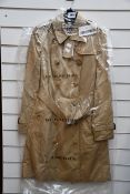 An as new Burberry Heritage Chelsea mid length trench coat (UK 6 - RRP €1790).