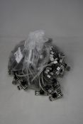 A bag of approximately one hundred Triton flow sensor assembly units (Including ‘O’ rings) (PN: