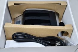 A boxed as new RRC 2-bay battery charger (PN: PMC02A) (Requires UK adapter).