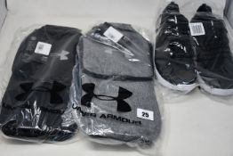 A pair of as new Under Armour Charged trainers (UK9, no box) and four Under Armour golf shoe bags (
