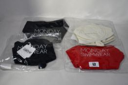 Seven items of as new Monday Swimwear; two Clovelly tops (L - RRP £52), Byron bottom (L -RRP £43),