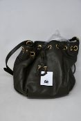 A pre-owned Salvatore Ferragamo drawstring crossbody bag (Excellent condition).