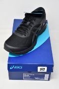 A pair of as new Asics Gel-Kayano 25 trainers (UK 9.5).