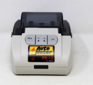 A boxed as new Auto Meter PR-12 Infrared External Printer (UK plug adaptor required).