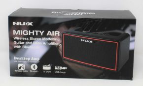 A boxed as new NuX Mighty Air Wireless Stereo Modelling Guitar & Bass Amplifier with Bluetooth.