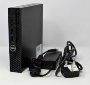 A pre-owned Dell OptiPlex 3070 Micro Form Factor PC with Intel Core i5-9500T 2.20GHz Processor,