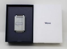A boxed as new Embr Wave Temperature Control Bracelet in Silver (Box opened).
