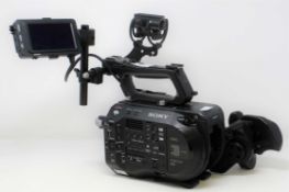 A pre-owned Sony PXW-FS7 II XDCAM 4K Super 35 E-mount Camera Body with Grip and LCD Monitor (M/N: