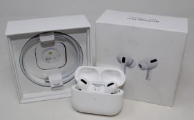 A pre-owned pair of Apple Airpods Pro with Wireless Charging Case (A2083 A2084 A2190) (box, as new