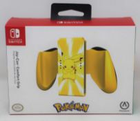 A boxed as new PowerA Pikachu Edition Joy-Con Comfort Grip for Nintendo Switch (Box sealed).