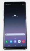 A pre-owned Samsung Galaxy Note 8 SM-N950F 64GB in Black (FRP clear. Some cosmetic scratches to