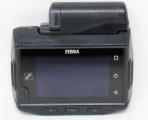 SOLD FOR PARTS: A pre-owned Zebra WT6000 WT60A0-TX2NEWR Wearable Computer with battery (Untested,