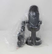 A pre-owned Blue Yeti Nano Premium Dual Pattern USB Microphone with stand and USB Cable.