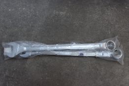 Two large Snap-On socket set handles together with two Facom long combination wrenches.