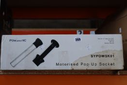 A boxed Powermatic motorized pop up socket.