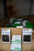 A box containing electrical supplies to include Schneider Ultimate Switched Sockets GU3520BPC (Low