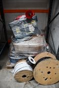 A quantity of assorted cabling reels/rolls.