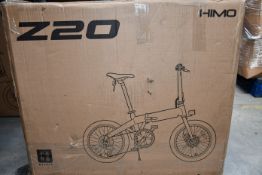 A Himo Z20 electric folding bike (Requires UK plug adaptor).