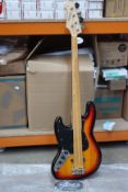 A boxed Harley Benton JB-75MN electric bass guitar.