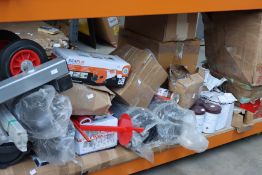 A quantity of miscellaneous items to include a Seaflo water pump and a heavy duty skate.