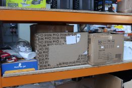 A quantity of miscellaneous pet related items to include food, toys and a pet travel bag.