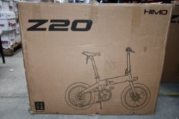 A Himo Z20 electric folding bike (Requires UK plug adaptor).