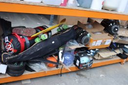 A quantity of miscellaneous sports related items to include golf clubs, weights and fishing