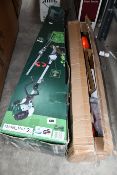 An Eskde electric long reach chainsaw hedge trimming kit together with a Parkside 4-in-1 strimmer.