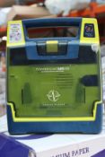 A Cardiac Science G3 AED trainer.
