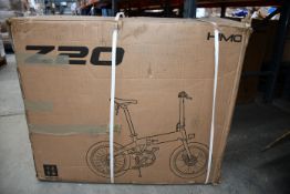 A boxed Himo Z20 Electric folding bike in white.