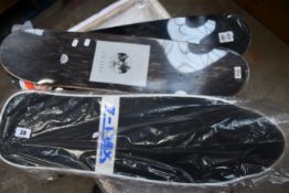 An as new Z-flex retro classic cruiser and two skateboard decks.