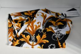 A pair of as new Versace leggings (Size 48 - RRP £460).