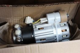 A boxed as new Wellbilt 020003095 motor and pump assembly (115/230V, 50/60Hz).