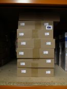 Fourteen individually boxed drill guide sets for cup style concealed hinges.