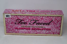 A Too Faced Plumping Revolution box set to include sixteen lip gloss (6.5ml), three Lip Injection