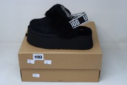A pair of as new Ugg Funkette slippers (UK 4).